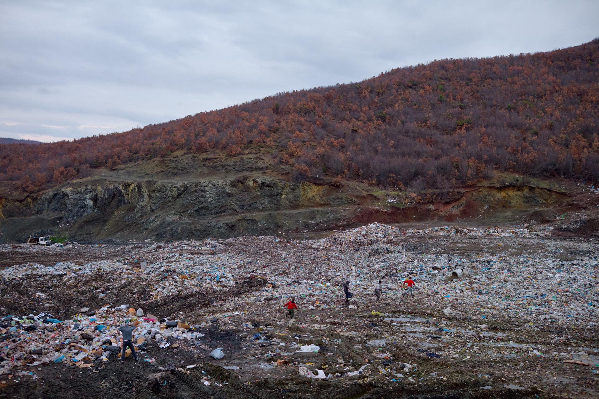 The 30 year old dump site Germova was restored by danish DANIDA after the civil war. Residents from Mitrovica and other nearby villages scavenges the dump site for recyclable plastic and metals. When the dump trucks arrive, the waste pickers jump onto the truck to get the best pieces as it empties it load.
